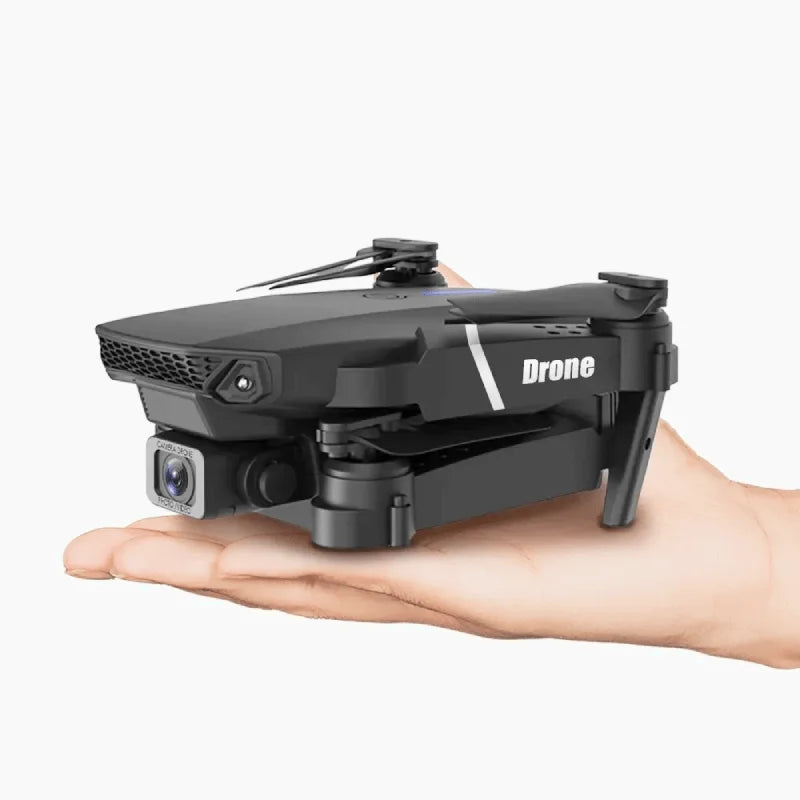 Mini drone med 4K kamera og kompakt, foldbart design til nem transport og imponerende dronefotografi.