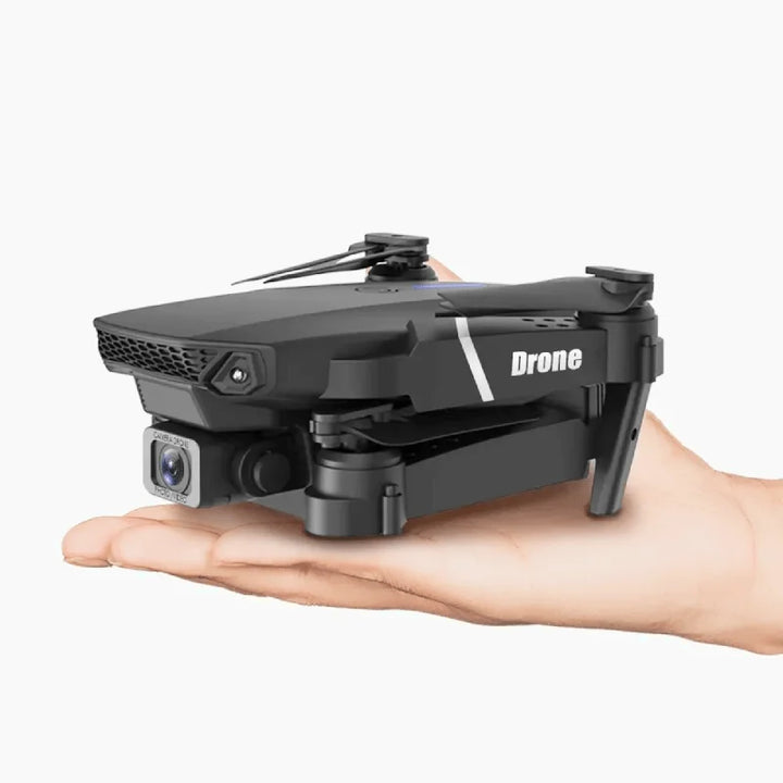 Mini drone med 4K kamera og kompakt, foldbart design til nem transport og imponerende dronefotografi.
