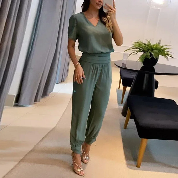"Moderigtigt sæt til kvinder i beige, bluse og bukser med elastisk talje, klassisk look til både casual og formelle lejlighed