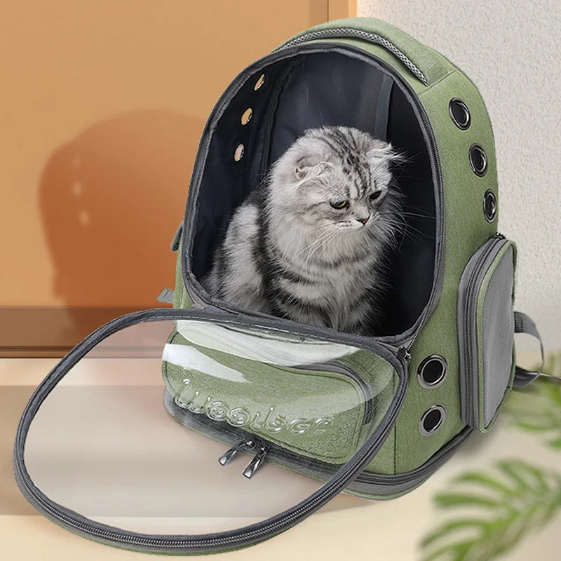 Sidevisning af transportrygsæk til kæledyr, med praktiske lommer til vandflaske & snacks til kat/hund.