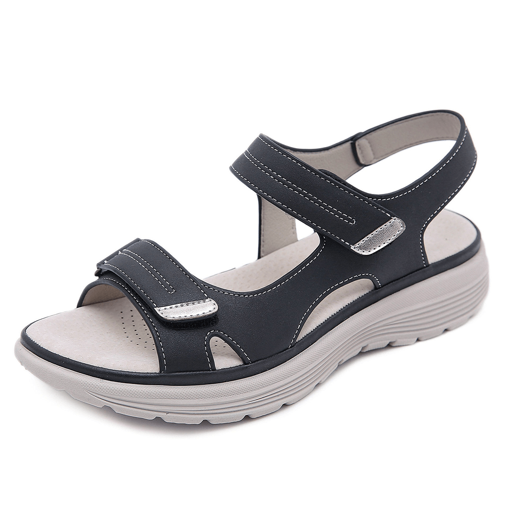"Ortopædiske sandaler med ergonomisk design, bred tåboks og svangstøtte, perfektioneret for maksimal komfort og stabilitet."