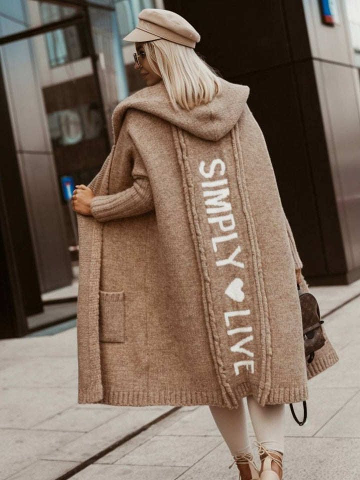 Oversized kvindehættetrøje med print, langærmet og komfortabel, perfekt til afslappede stunder.