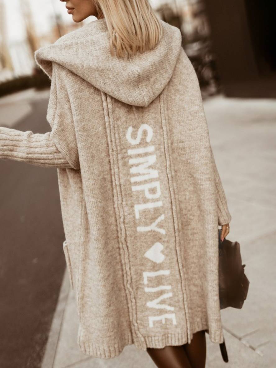 Varm og komfortabel oversized hættetrøje med print til efteråret, med praktiske lommer.