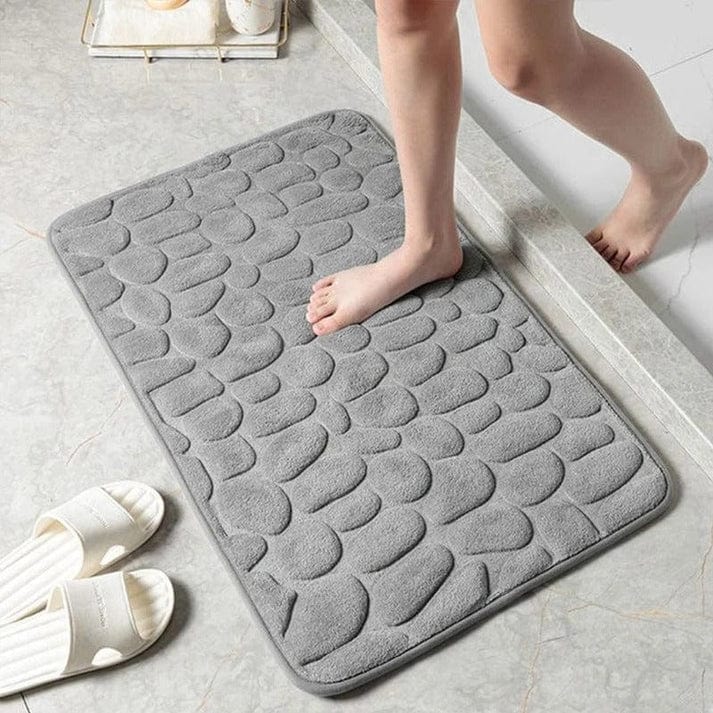 "Premium antiskrid brusemåtte, hvid, i flannel og memory-skum for øget komfort og sikkerhed på badeværelset."