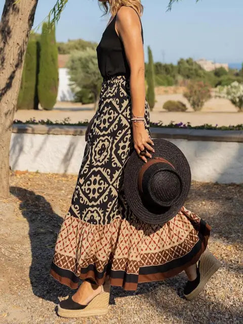 Retro Boho lang sommer nederdel i pink, blød og flydende, perfekt til sommeraftener, bohemisk stil, let materiale.