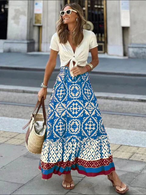 Retro Boho lang sommer nederdel i pink, blød og flydende, perfekt til sommeraftener, bohemisk stil, let materiale.