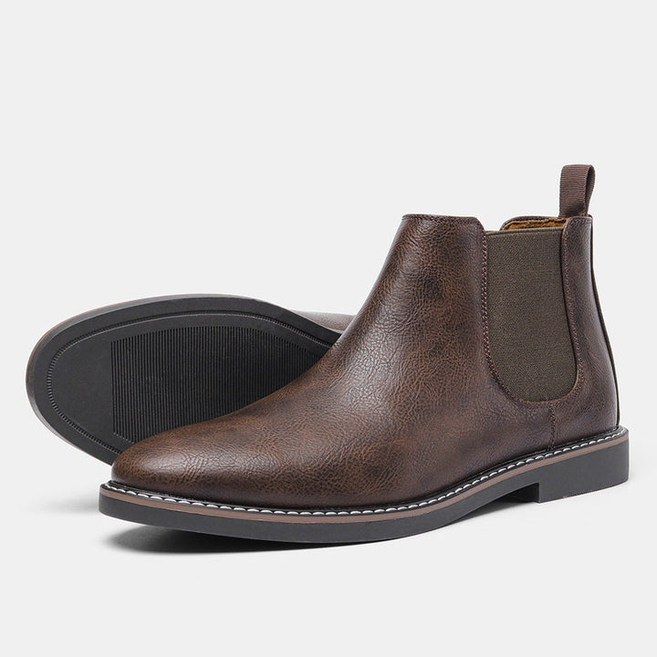 "Retro Chelsea-støvler til mænd, brun læder, slip-on design, polstrede indersåler, gummisåler for optimal komfort."