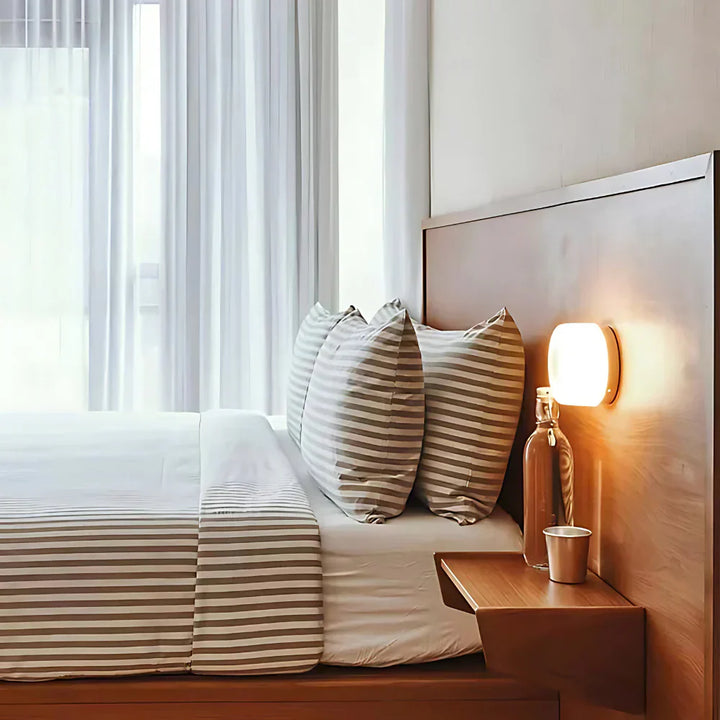 Design væglampe, rund form med dekorativ belysning for stilfuldt interiør.