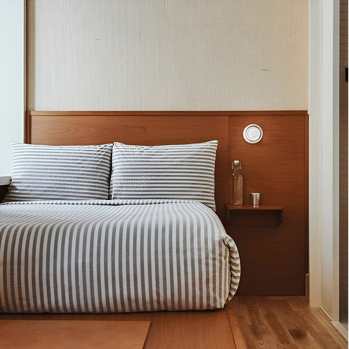 Rund væglampe i minimalistisk design, moderne og funktionel belysning.