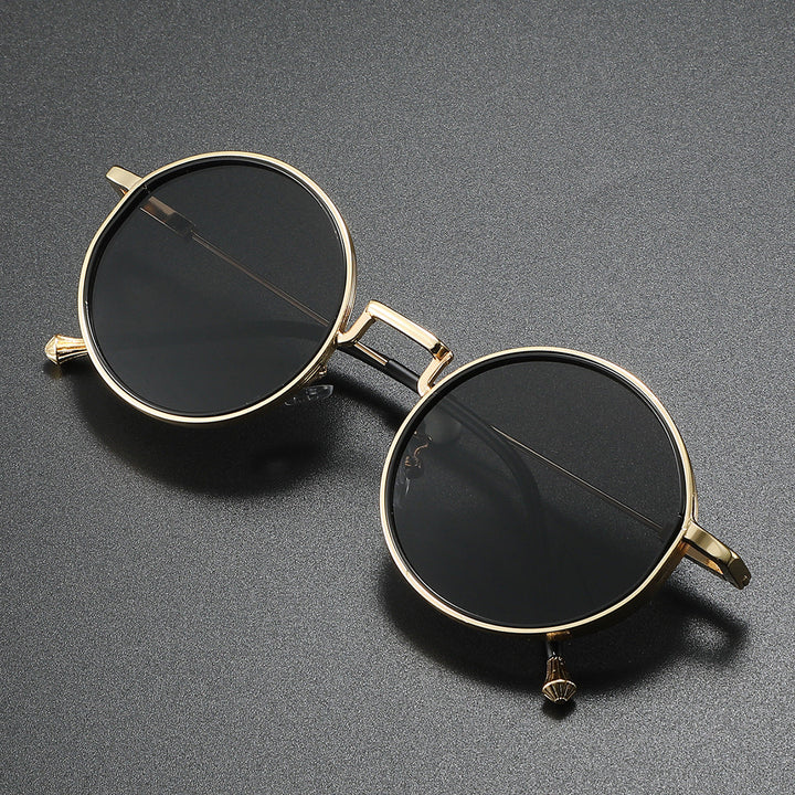 Stilfulde runde metal solbriller, perfekte til sommer. Unisex design med UV400 beskyttelse.