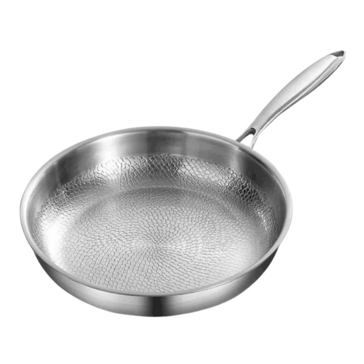 Sølv titanium induktionspande med elegant hamret finish. Robust stegepande til sund madlavning.