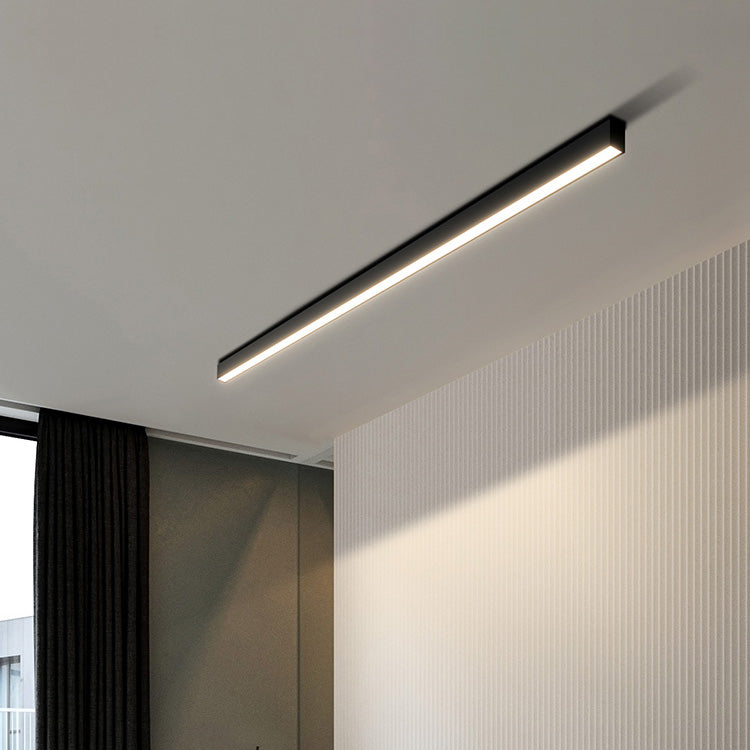 "Skandinavisk LED-loftslampe i moderne design med lysende aluminiums- og akrylelementer til stue eller kontor."