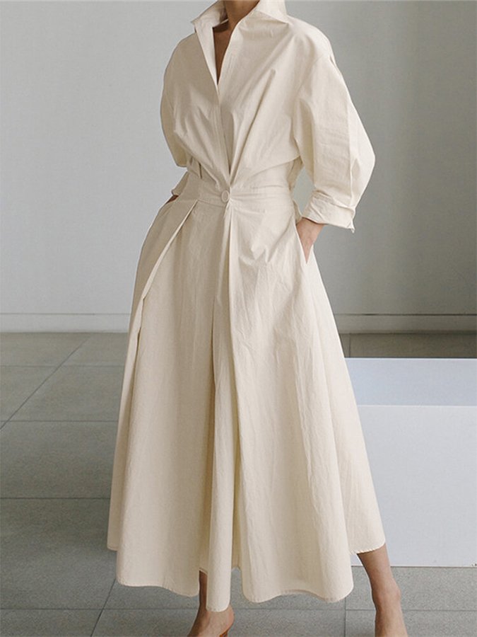 Elegant dame midi kjole med knapper, flatterende silhuet. Perfekt til hverdag og festlig brug.