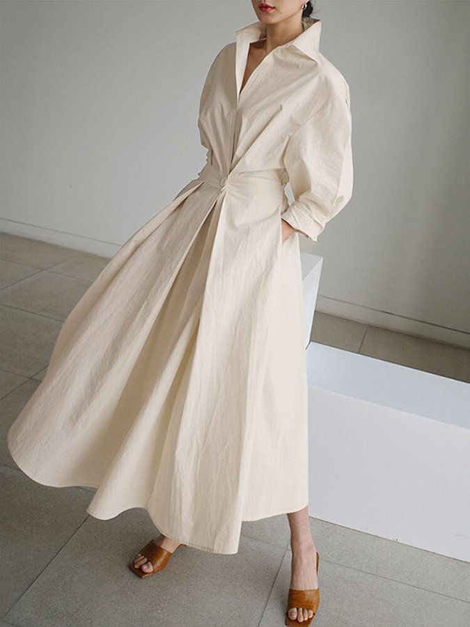 Elegant dame midi kjole med knapper, flatterende silhuet. Perfekt til hverdag og festlig brug.