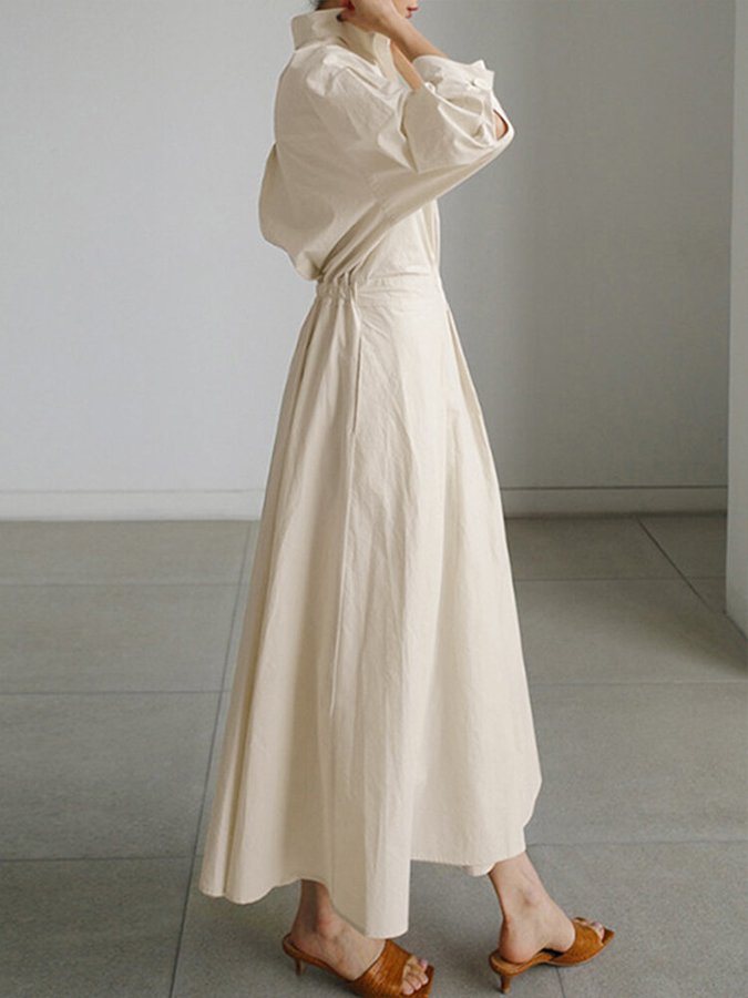 Elegant dame midi kjole med knapper, flatterende silhuet. Perfekt til hverdag og festlig brug.