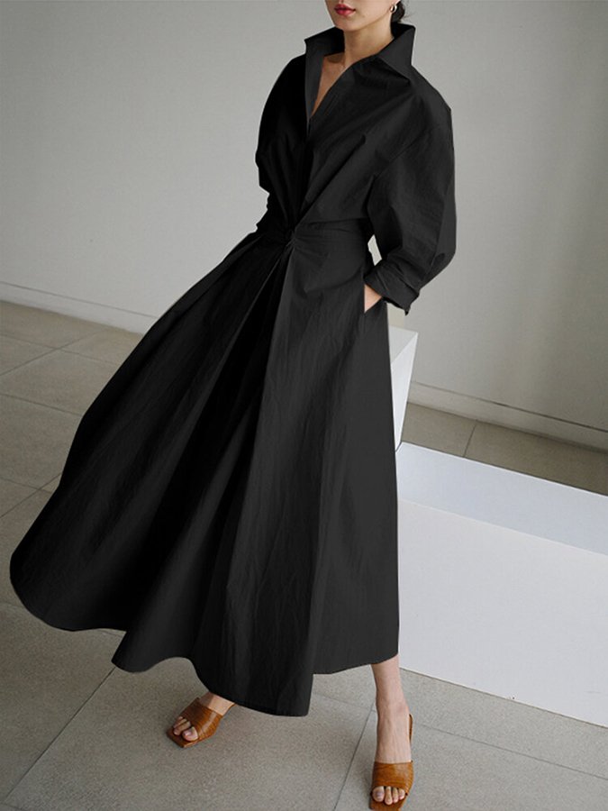 Elegant dame midi kjole med knapper, flatterende silhuet. Perfekt til hverdag og festlig brug.