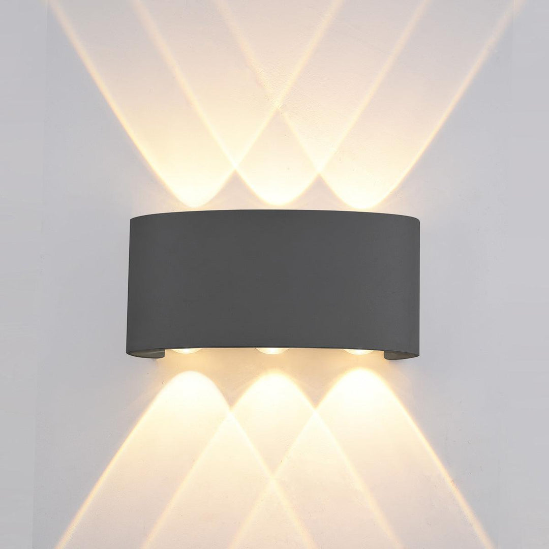 "Sort Ortelo væglampe af aluminium med LED, op- og nedad lys, IP65, moderne design til udendørs brug."