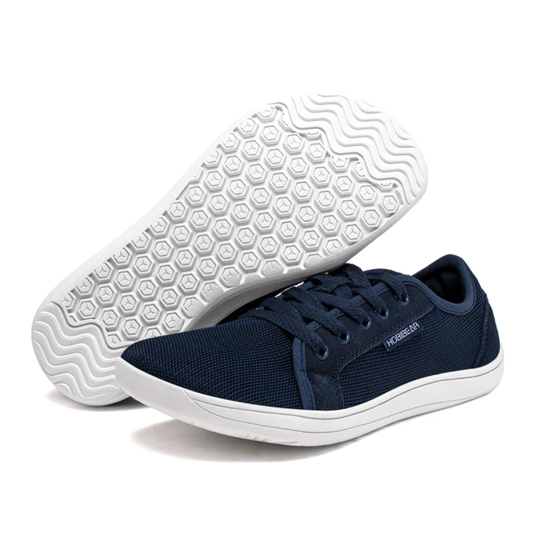 Sorte barfods sneakers til mænd med strikket overdel, bred tåboks og gummisål, perfekt til udendørs brug og daglig komfort.