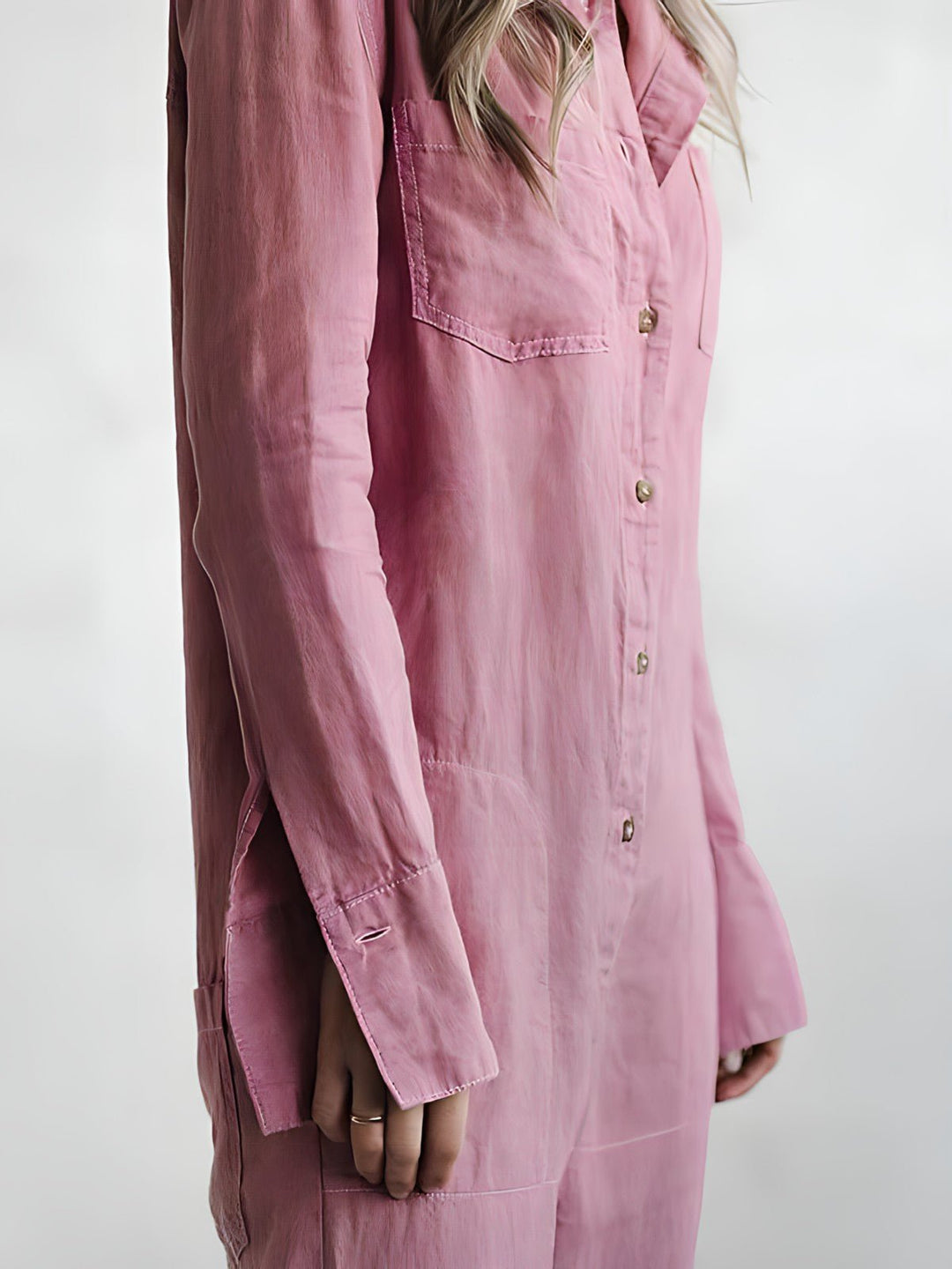 Stilfuld blå og grøn Kaya jumpsuit til kvinder, elegant design med lange ærmer og komfortabel pasform til enhver lejlighed.