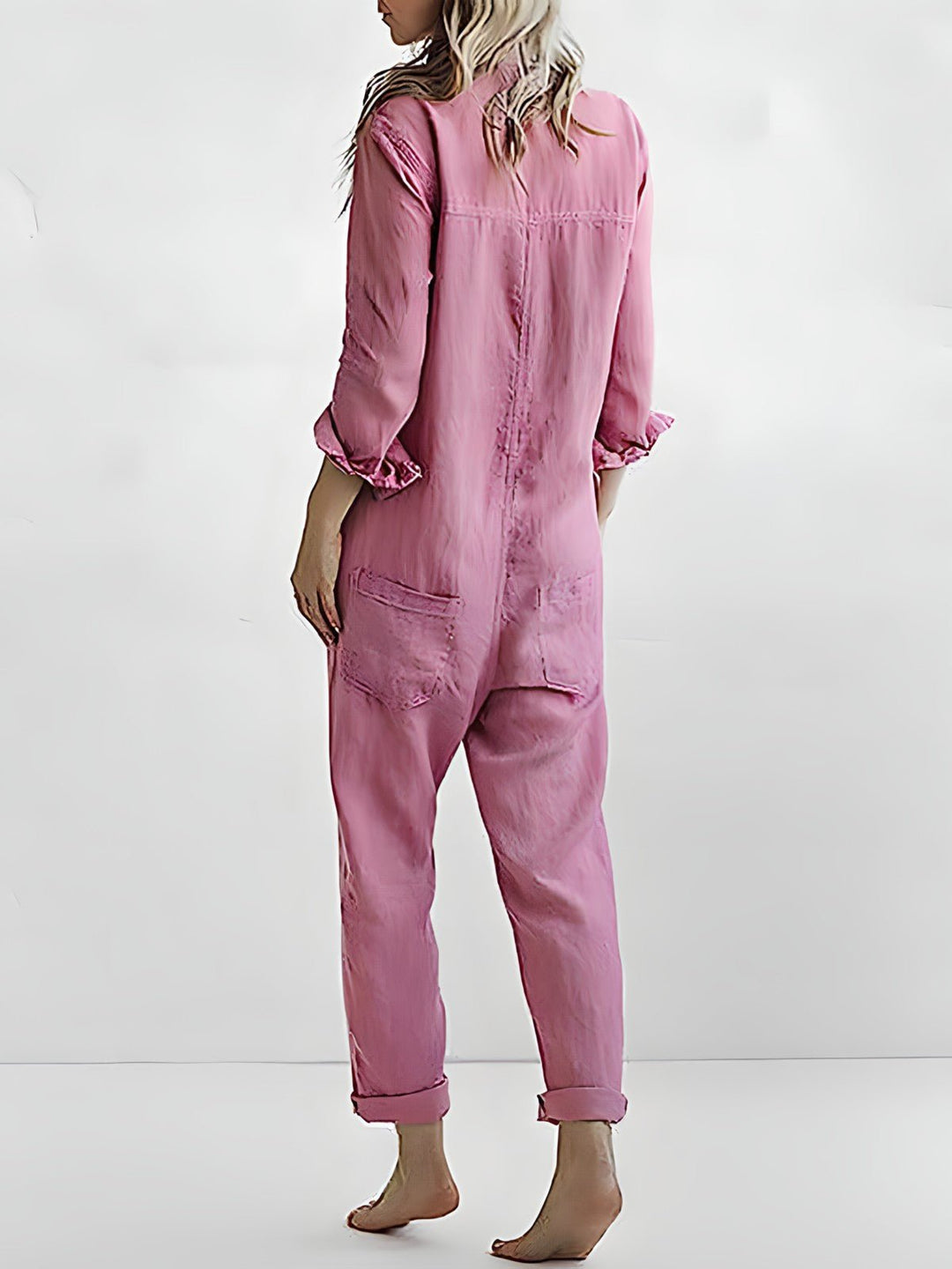 Stilfuld blå og grøn Kaya jumpsuit til kvinder, elegant design med lange ærmer og komfortabel pasform til enhver lejlighed.