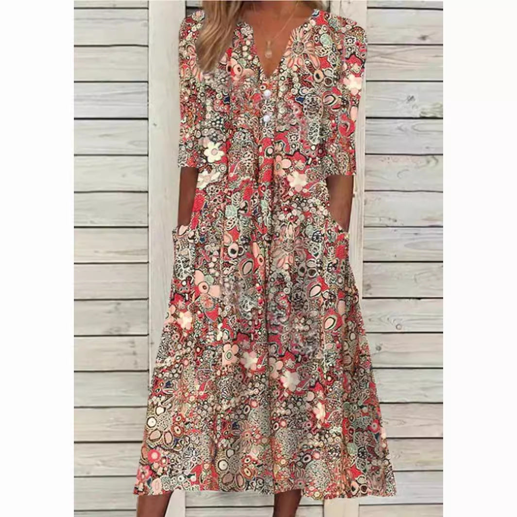 Stilfuld blomstret skjortekjole til kvinder, med knaplukning og elegant pasform, perfekt for komfortabel og raffineret stil.