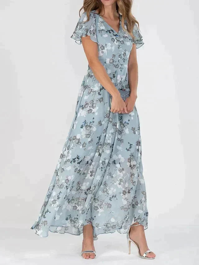 Kvinders elegante blomstrede maxi kjole med V-hals, let fald og alsidigt design.
