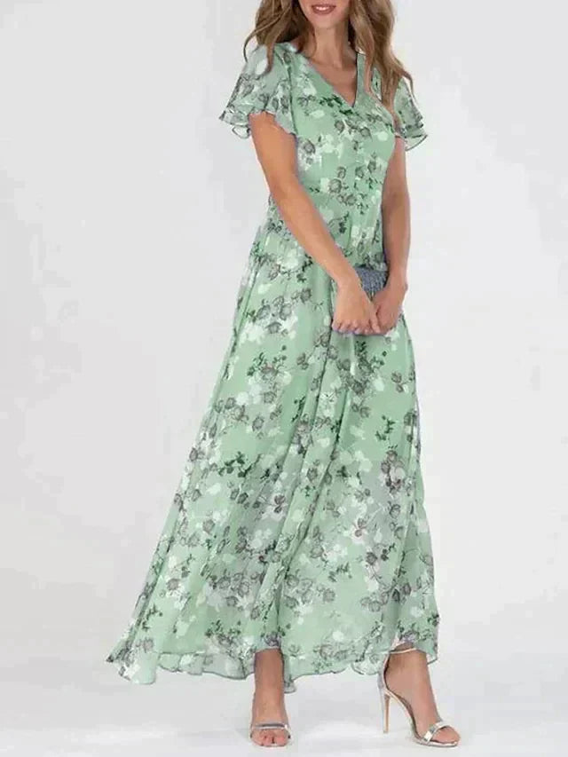 Kvinders elegante blomstrede maxi kjole med V-hals, let fald og alsidigt design.