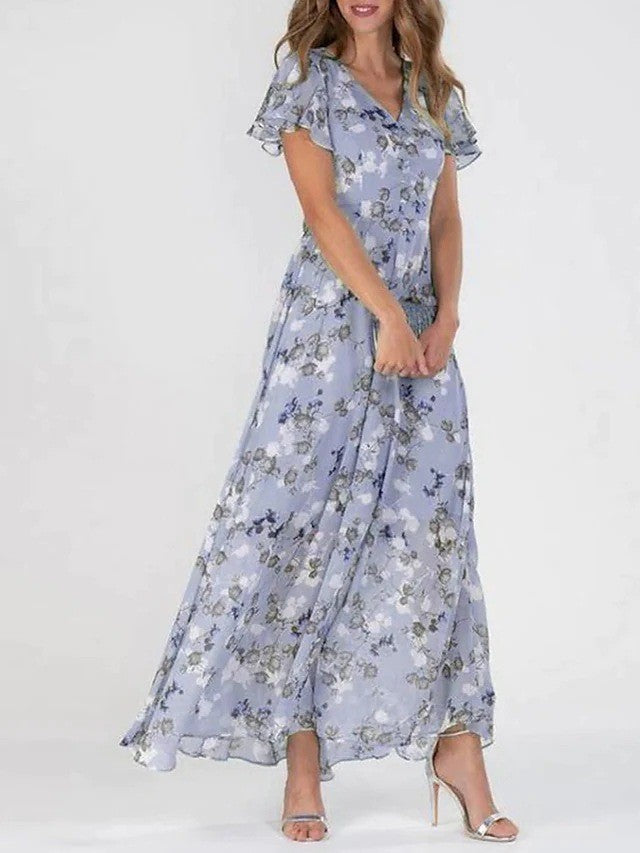 Kvinders elegante blomstrede maxi kjole med V-hals, let fald og alsidigt design.