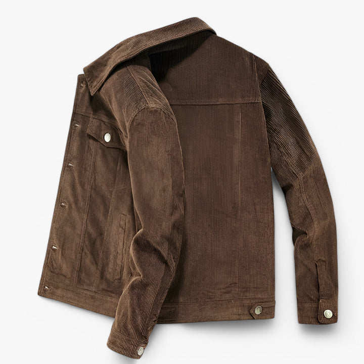 Stilfuld fløjlsjakke med knaplukning og elegante lommedetaljer, perfekt til herremode og giver en sofistikeret stil.