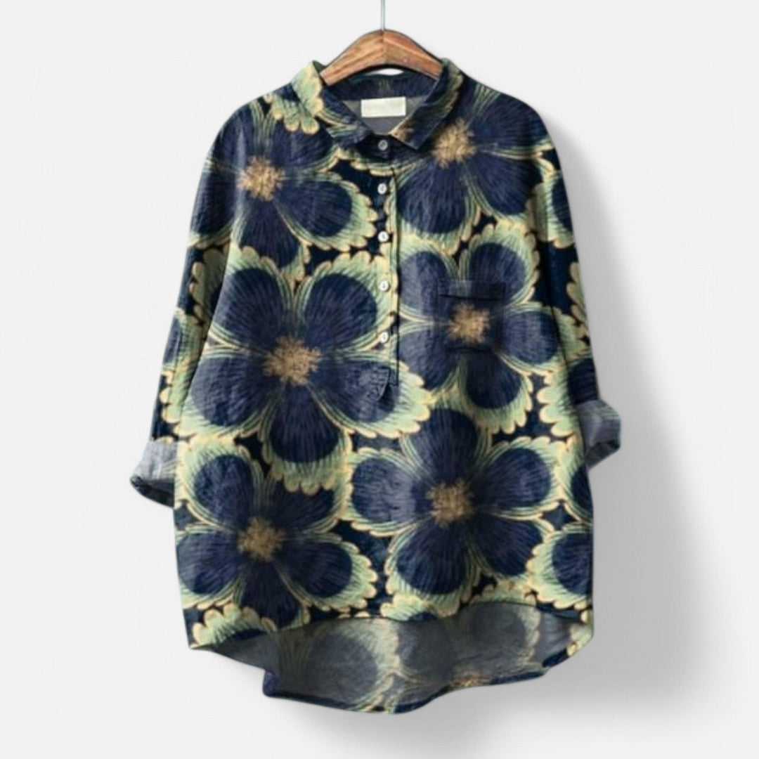 "Stilfuld løs pasform blomstret bluse til kvinder med elegante detaljer, perfekt til hverdags- og festlige lejligheder."