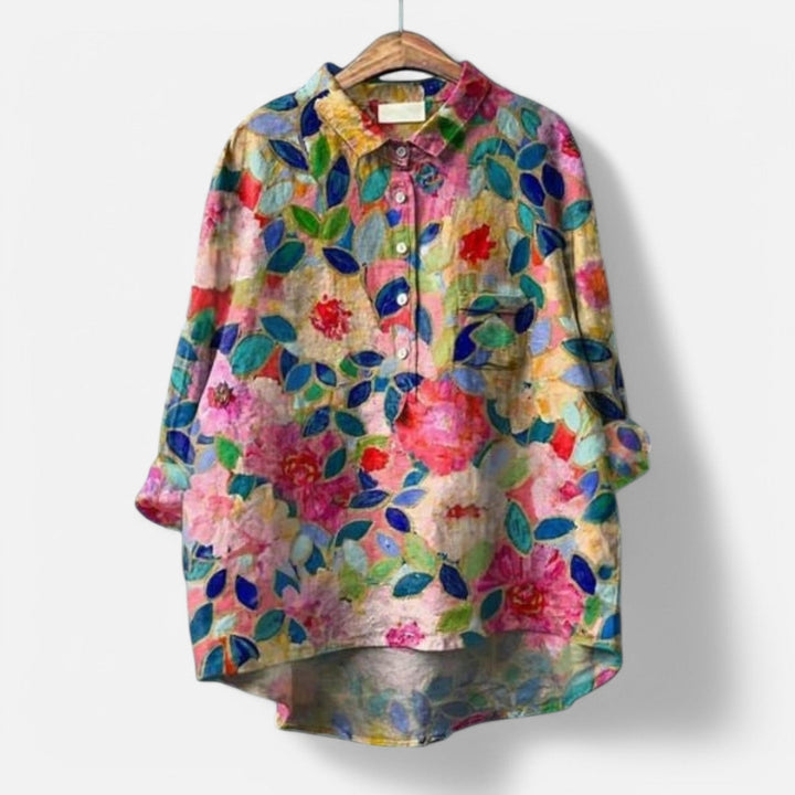 "Stilfuld løs pasform blomstret bluse til kvinder med elegante detaljer, perfekt til hverdags- og festlige lejligheder."