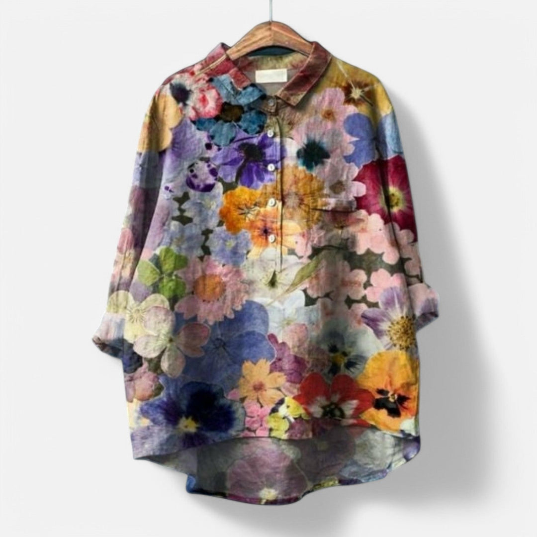 "Stilfuld løs pasform blomstret bluse til kvinder med elegante detaljer, perfekt til hverdags- og festlige lejligheder."