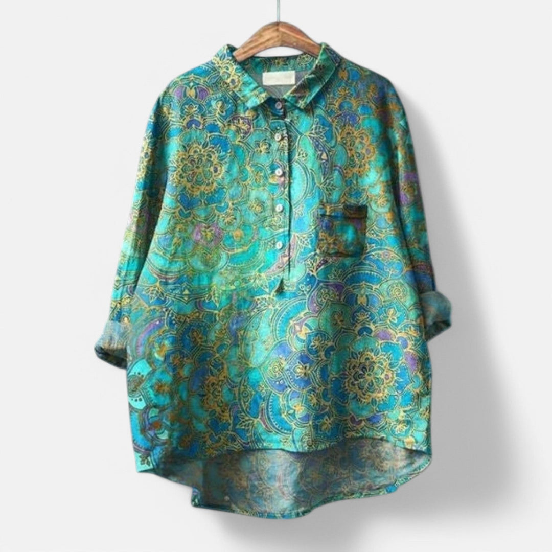 "Stilfuld løs pasform blomstret bluse til kvinder med elegante detaljer, perfekt til hverdags- og festlige lejligheder."