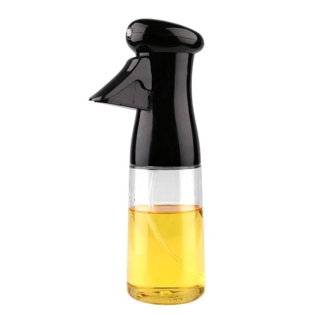 "Stilfuld oliespraydispenser, ergonomisk design, let håndtering, 200 ml kapacitet til præcis oliemængde ved madlavning."