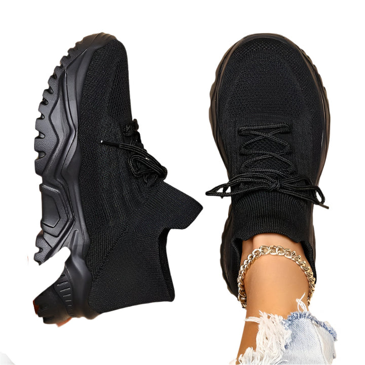 Stilfulde ortopædiske sneakers til kvinder med moderne design og ekstra svangstøtte, ideelle til daglig komfort.