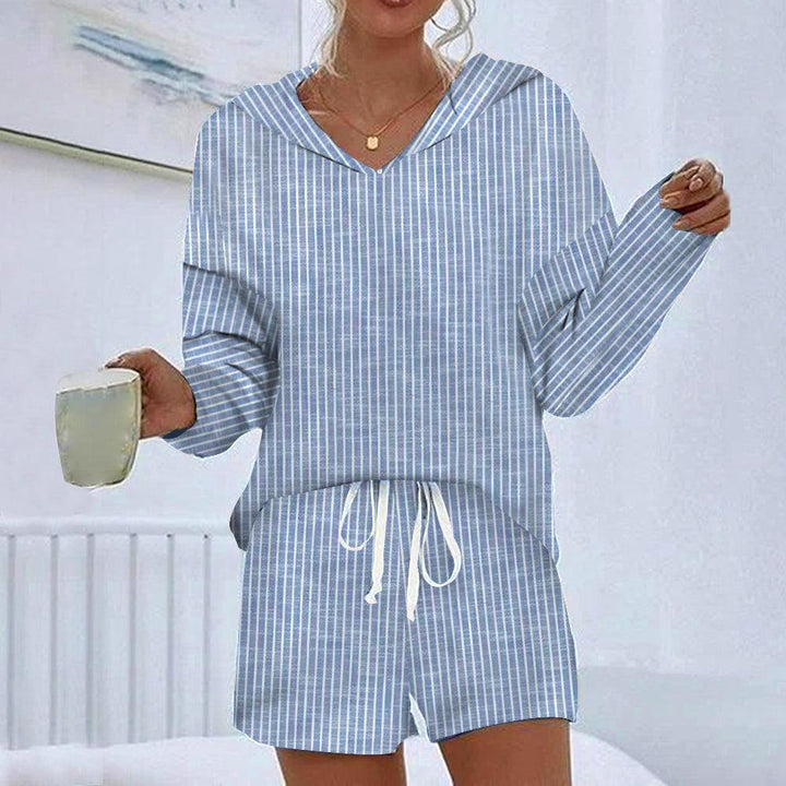 "Stribet pyjamassæt i blødt bomuld med elastisk talje, perfekt til både mænd og kvinder, elegant og komfortabelt design."