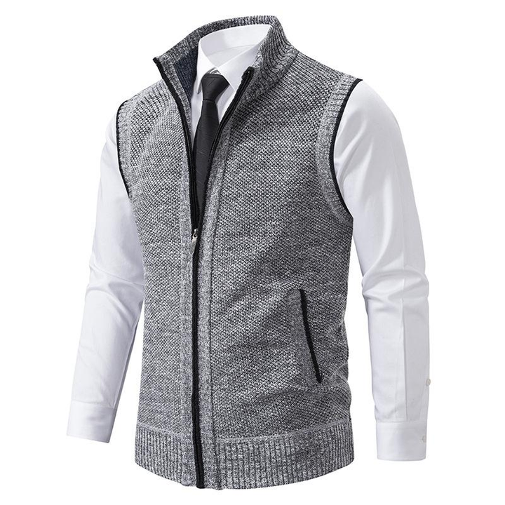 Strikket vest i klassisk stil, grå nuance, tidløs design. Perfekt til både mænd og kvinder, ideel til formelle og afslappede 