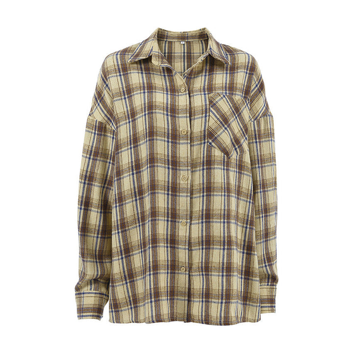 Oversize ternet skjorte til kvinder, afslappet pasform, perfekt til jeans eller shorts, med knaplukning og brede ærmer.