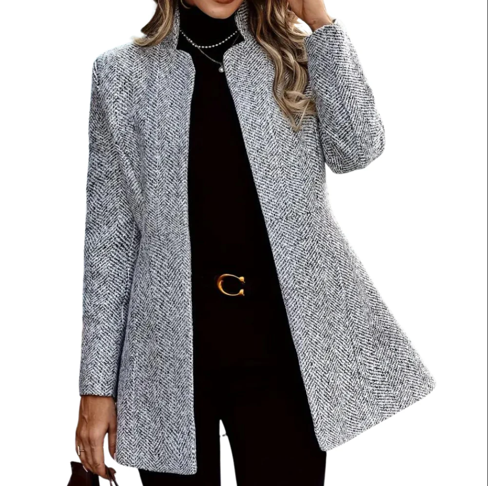Elegant dameblazer med tidløst design, skræddersyet pasform og raffinerede detaljer, perfekt til enhver lejlighed.