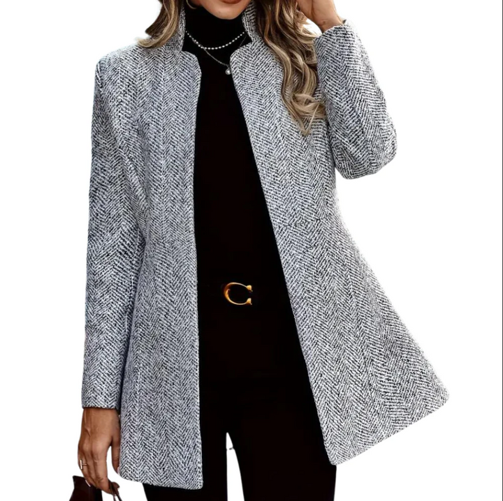 Elegant dameblazer med tidløst design, skræddersyet pasform og raffinerede detaljer, perfekt til enhver lejlighed.
