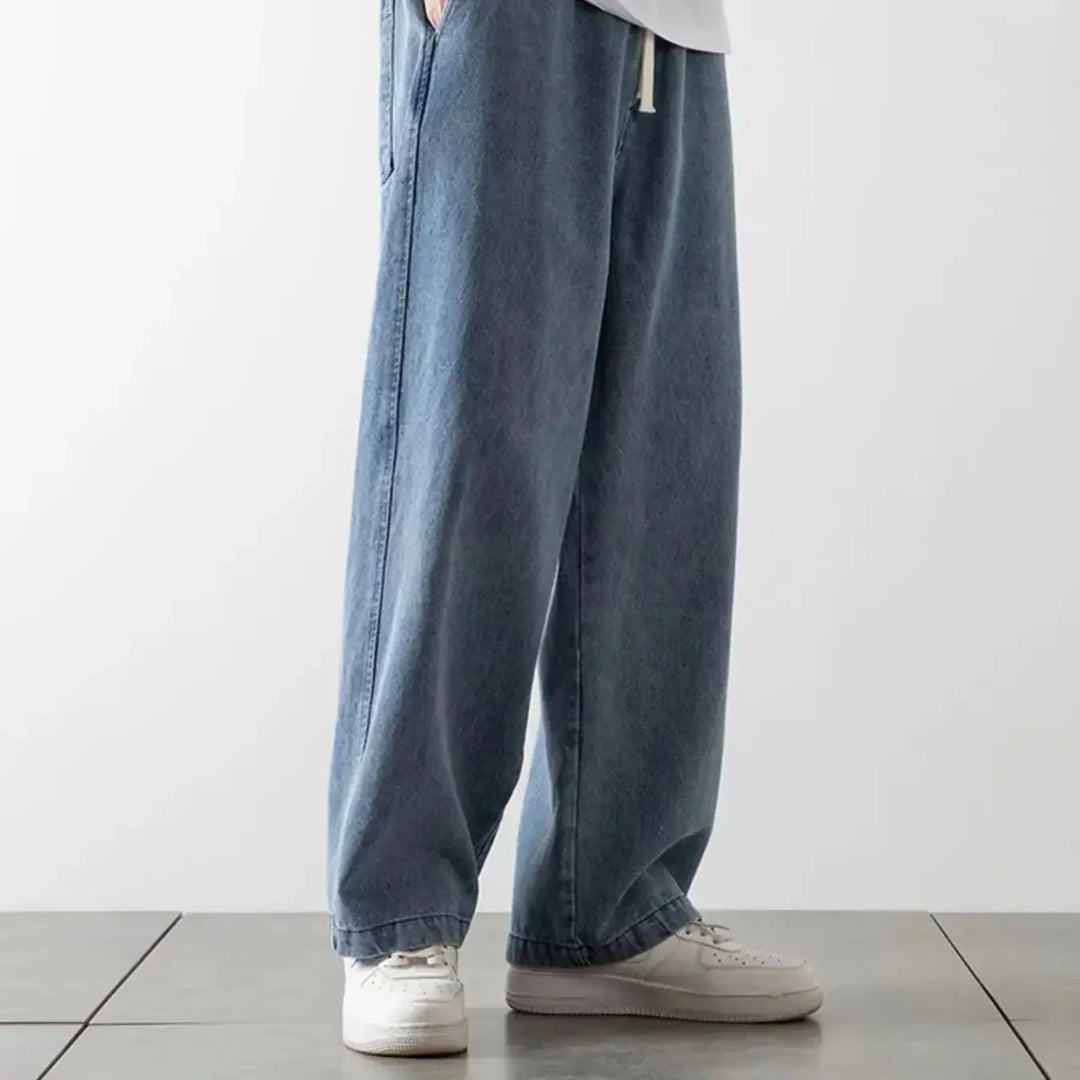 Komfortable unisex baggy jeans med afslappet pasform og fleksibel elastisk talje.
