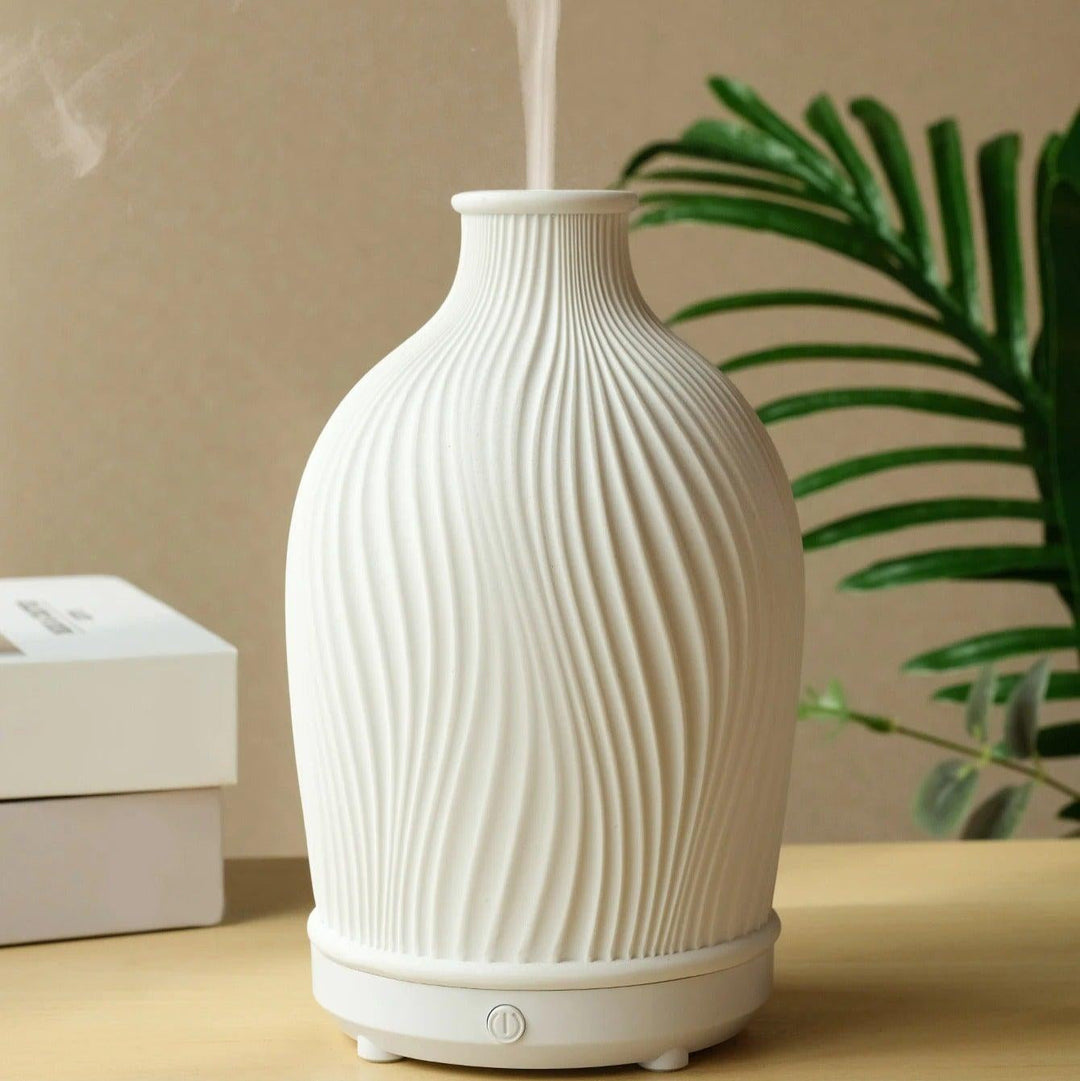 "Vaseformet æterisk olie-luftfugter i boho-stil, diffusertåge, blødt lys, ideel til hjemmeindretning, let betjening."