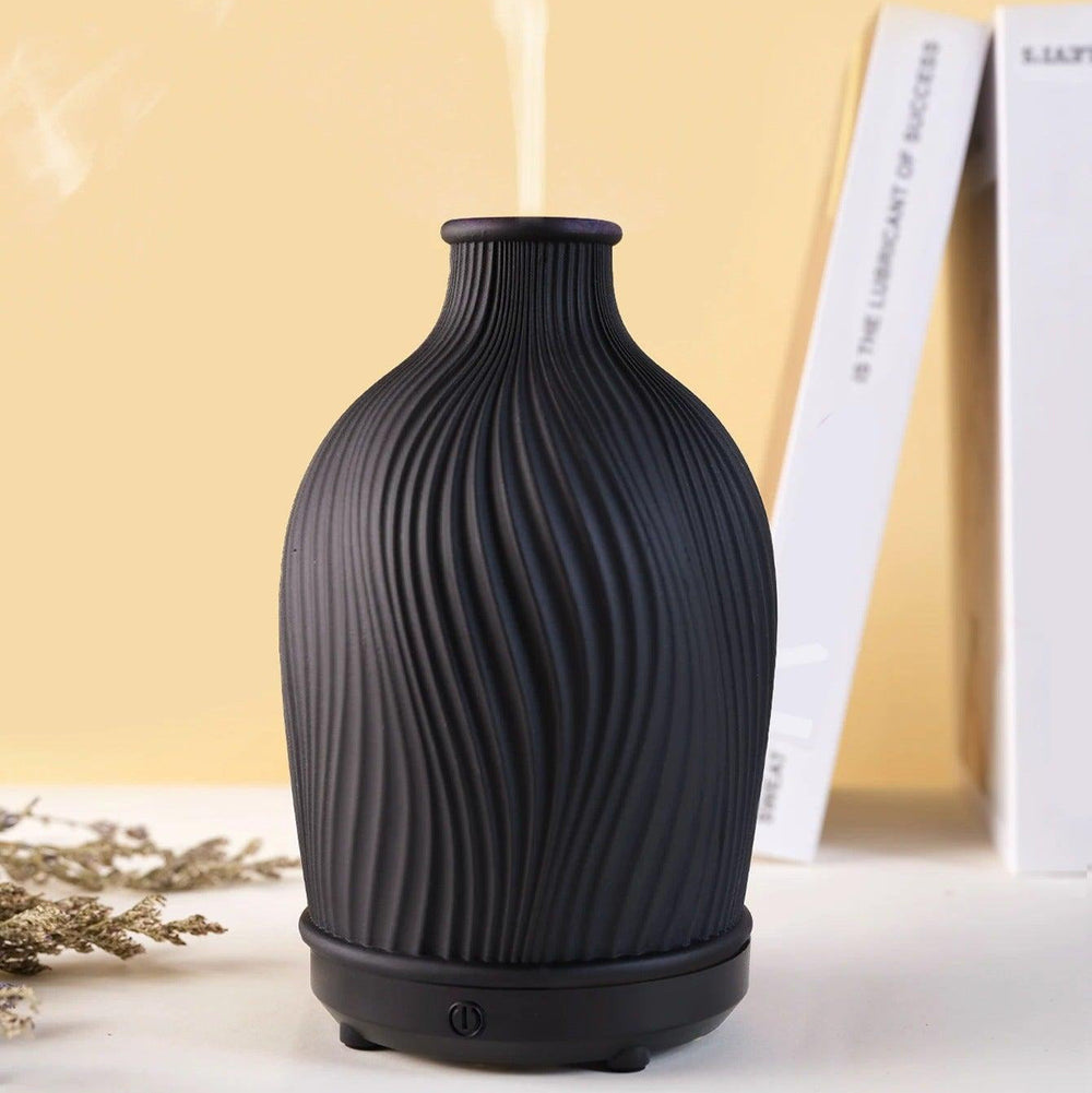 "Vaseformet æterisk olie-luftfugter i boho-stil, diffusertåge, blødt lys, ideel til hjemmeindretning, let betjening."