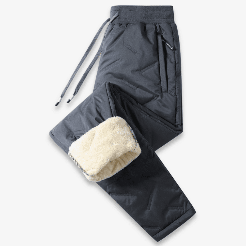 Vejrbestandige unisex termobukser til ekstrem kulde, isoleret foring, elastisk talje, vinterbrug, gråt design.