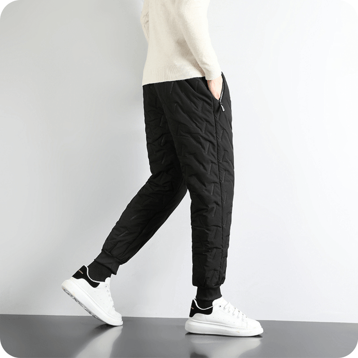 Komfortable sorte fleecebukser til vinter. Varme forede bukser med casual look.